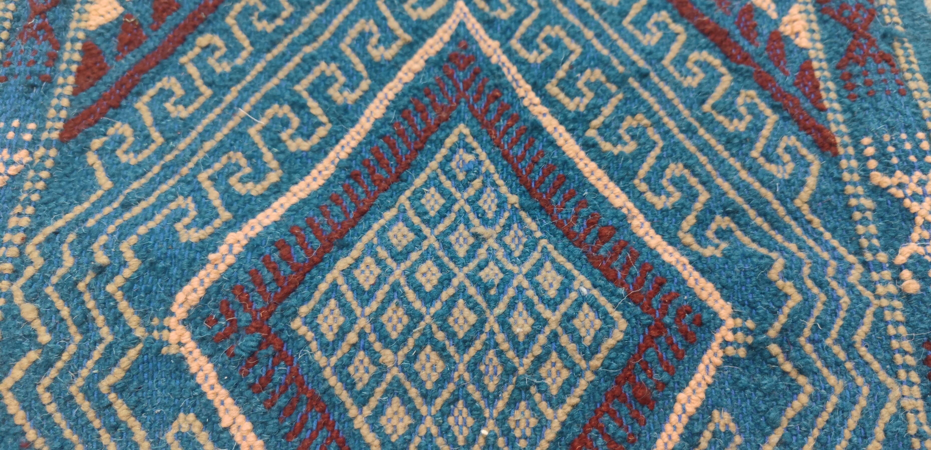 Handmade blue mergoum rug in natural wool