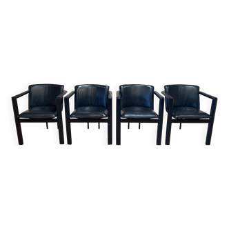 Suite de 4 fauteuils design cuir et métal.