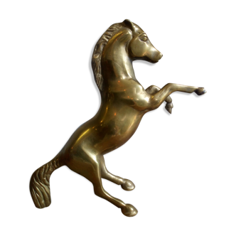 Horse pitched in solid brass