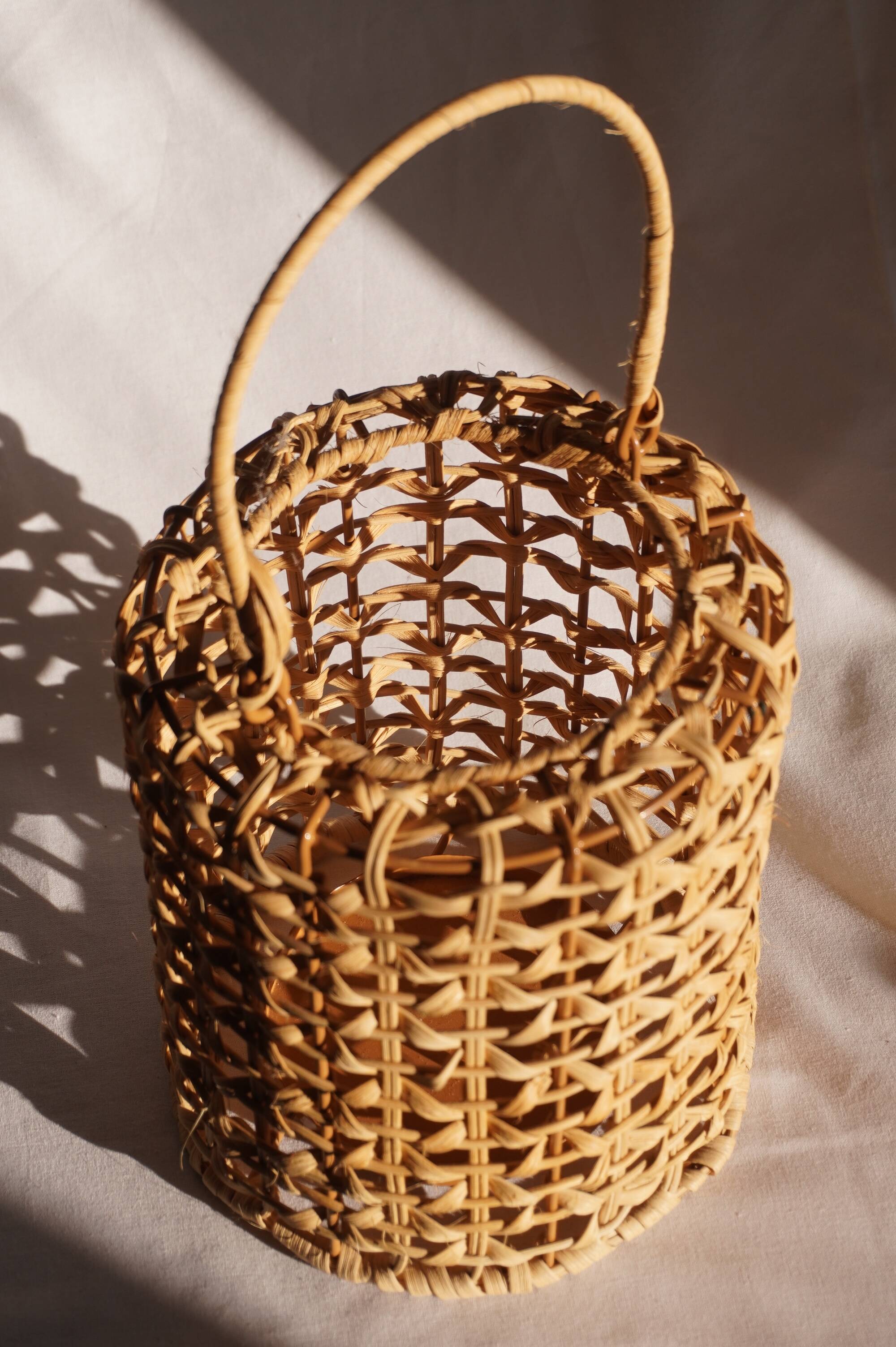 Wicker lantern / candle holder, metal frame