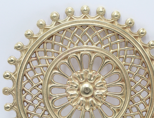 Vintage brass rosette underside