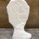 Young girl bust in plaster