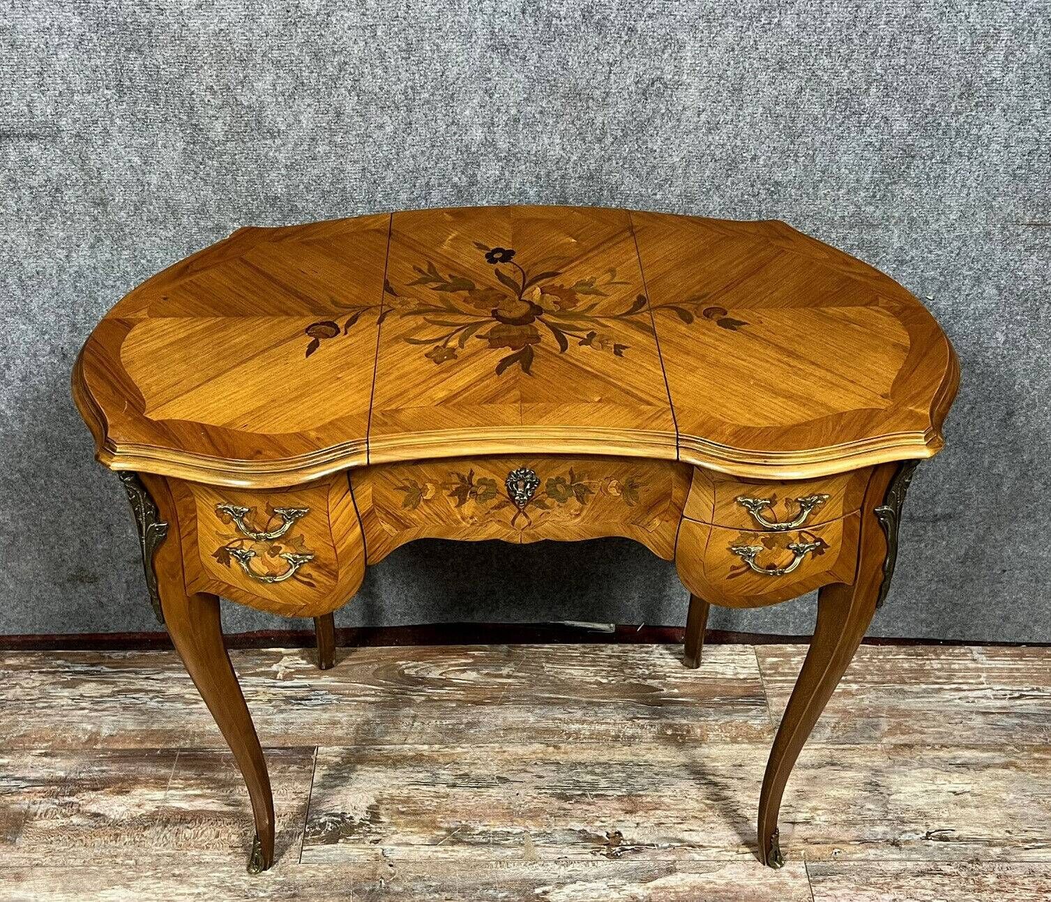 Louis XV style dressing table in "kidney" shape in rosewood decorated with marquetry flowers