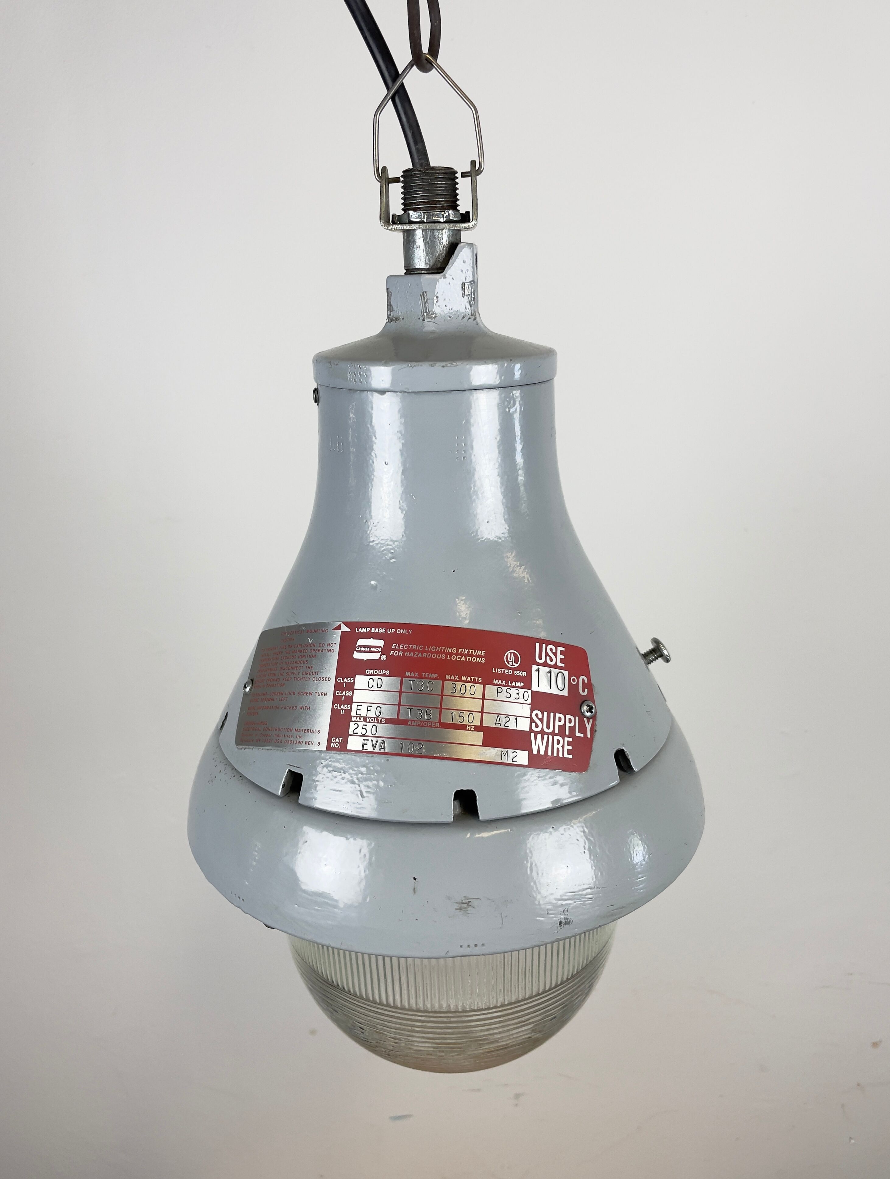 Grey industrial explosion proof light from Crouse-Hinds, 1970s