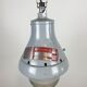 Grey industrial explosion proof light from Crouse-Hinds, 1970s