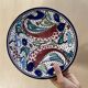 Multicolored fish ceramic decorative wall plates