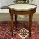 Louis XVI style bouillotte table in mahogany with a white marble top.