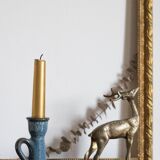 Antique candle holder in glazed ceramic