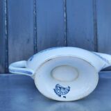 Old earthenware sauce boat