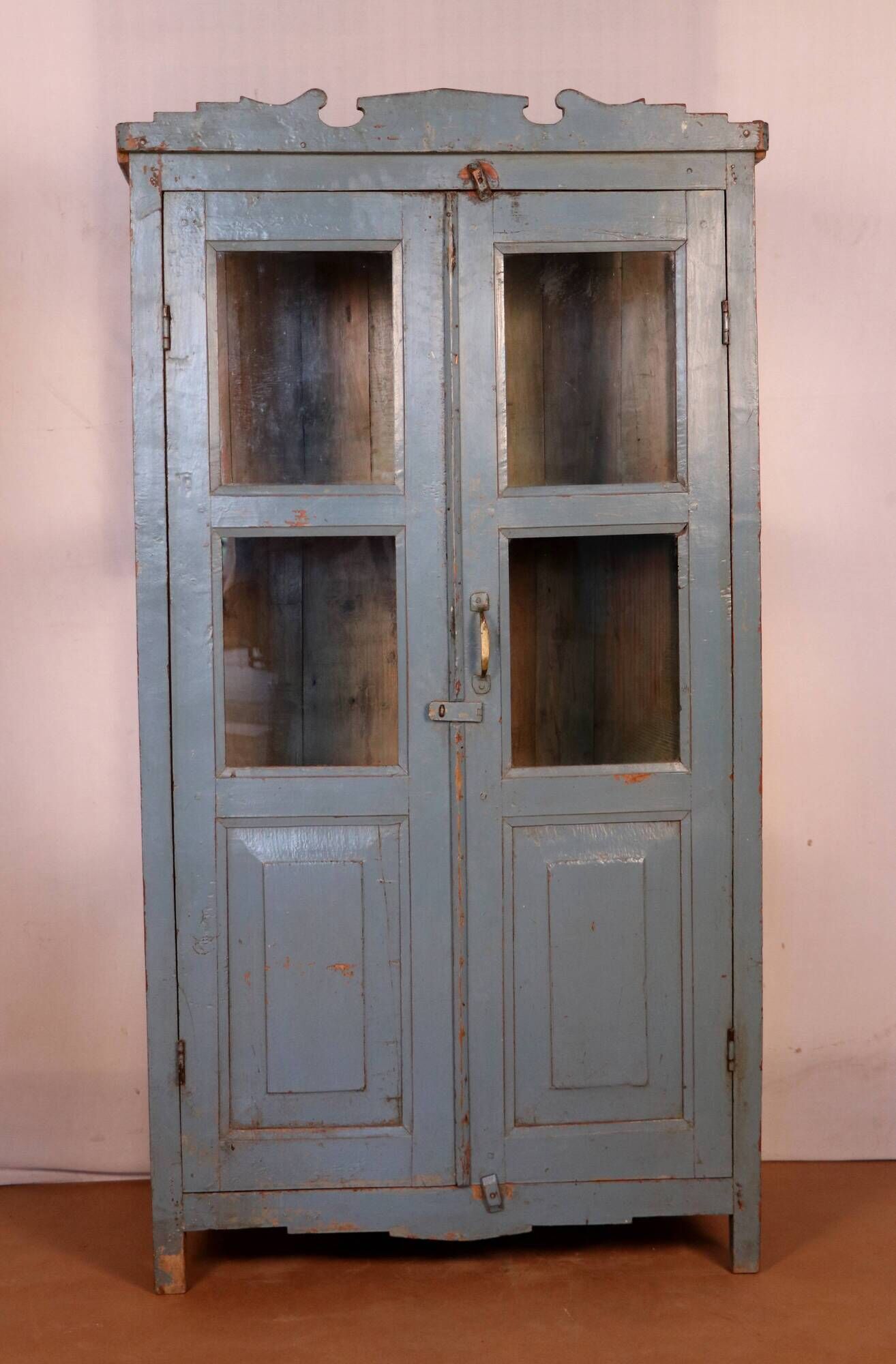 Old art deco display case in original Burmese teak with gray-blue patina