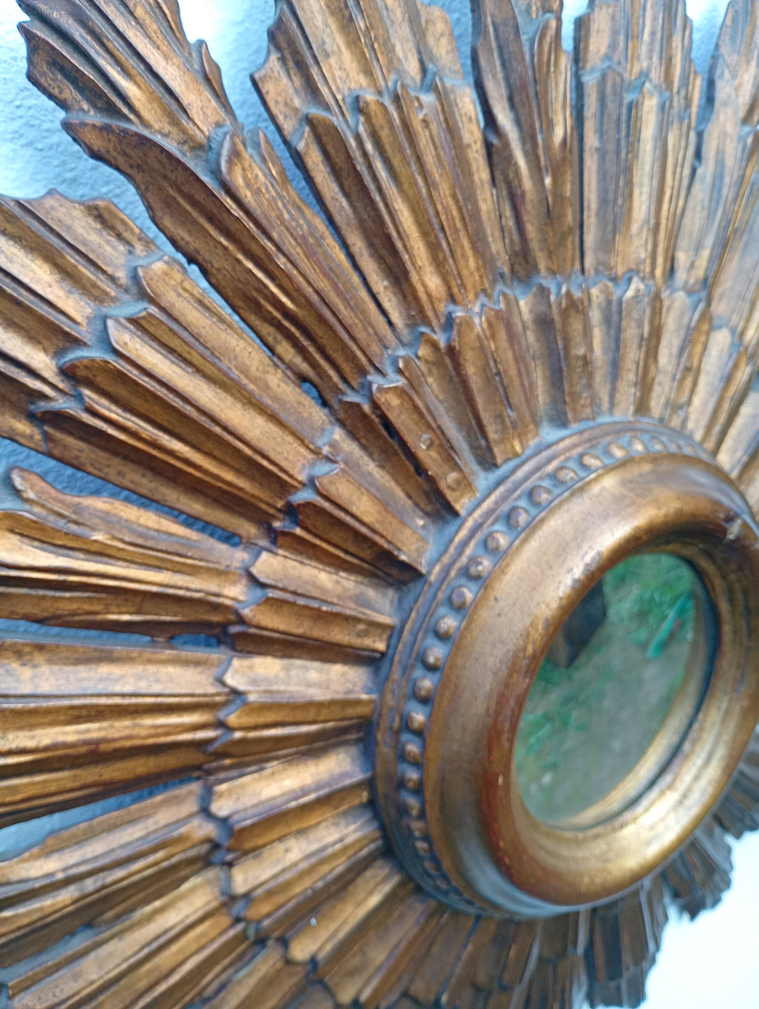 Grand miroir soleil des Pays-Bas en bois sculpté doré – années 60 m