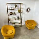 Old shelf in golden metal brass geometric library design 80s vintage