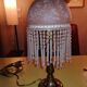 Bedside lamp with pampilles