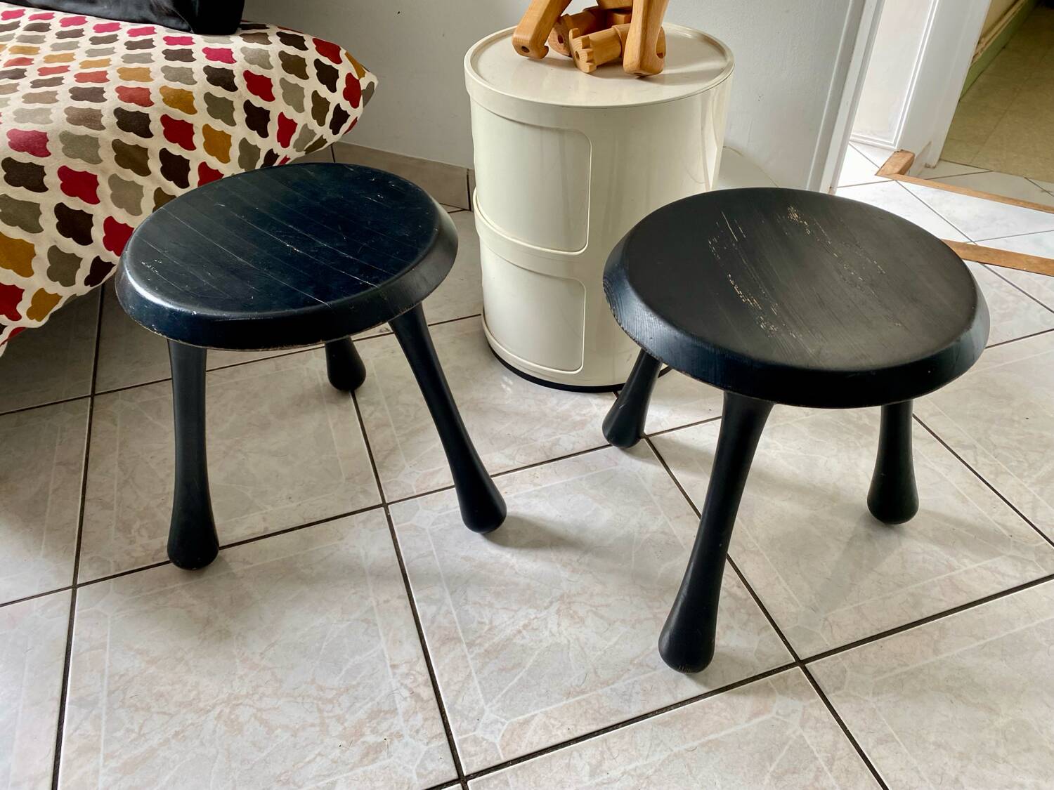 Pair of Ingvar Kamprad design tripod low stools, Habitat edition