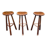 Set of three brutalist tripod stools
