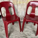 Pair of antique chairs stamp design henri massonnet red plastic 80's