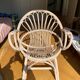Shell chair in pale pink painted rattan