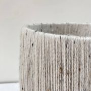 Rattan lamp and its mottled white wool lampshade