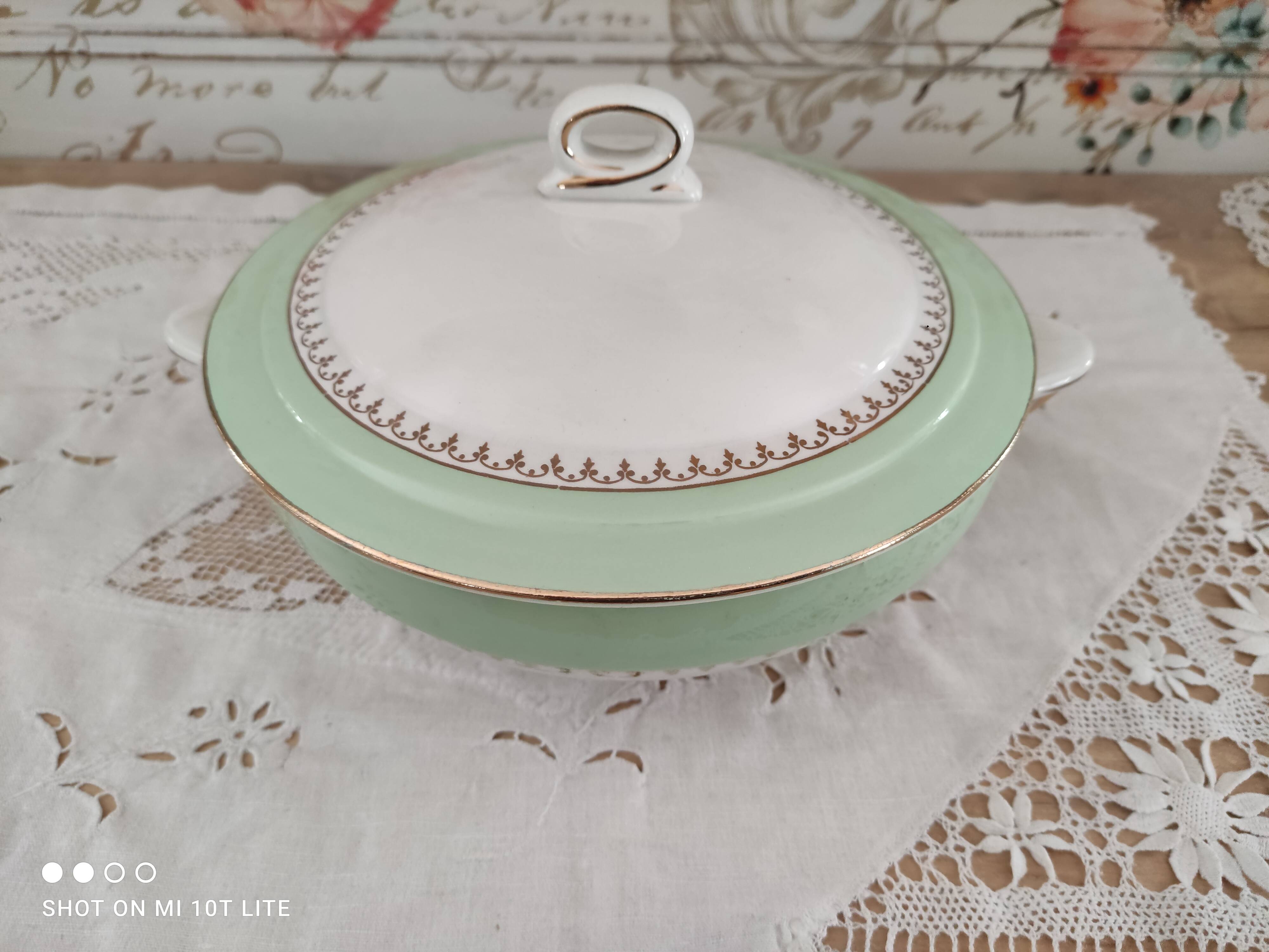 Water green vegetable dish with golden frieze, Cafés Lemaire.