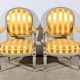 Pair of Cabriolet Armchairs, in rechampi wood, Louis XVI style – Late 19th century