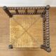 Turned wood corner chair with straw seat