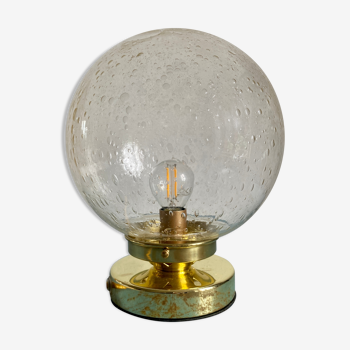 Vintage globe laying lamp in bulled glass