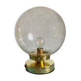 Vintage globe laying lamp in bulled glass