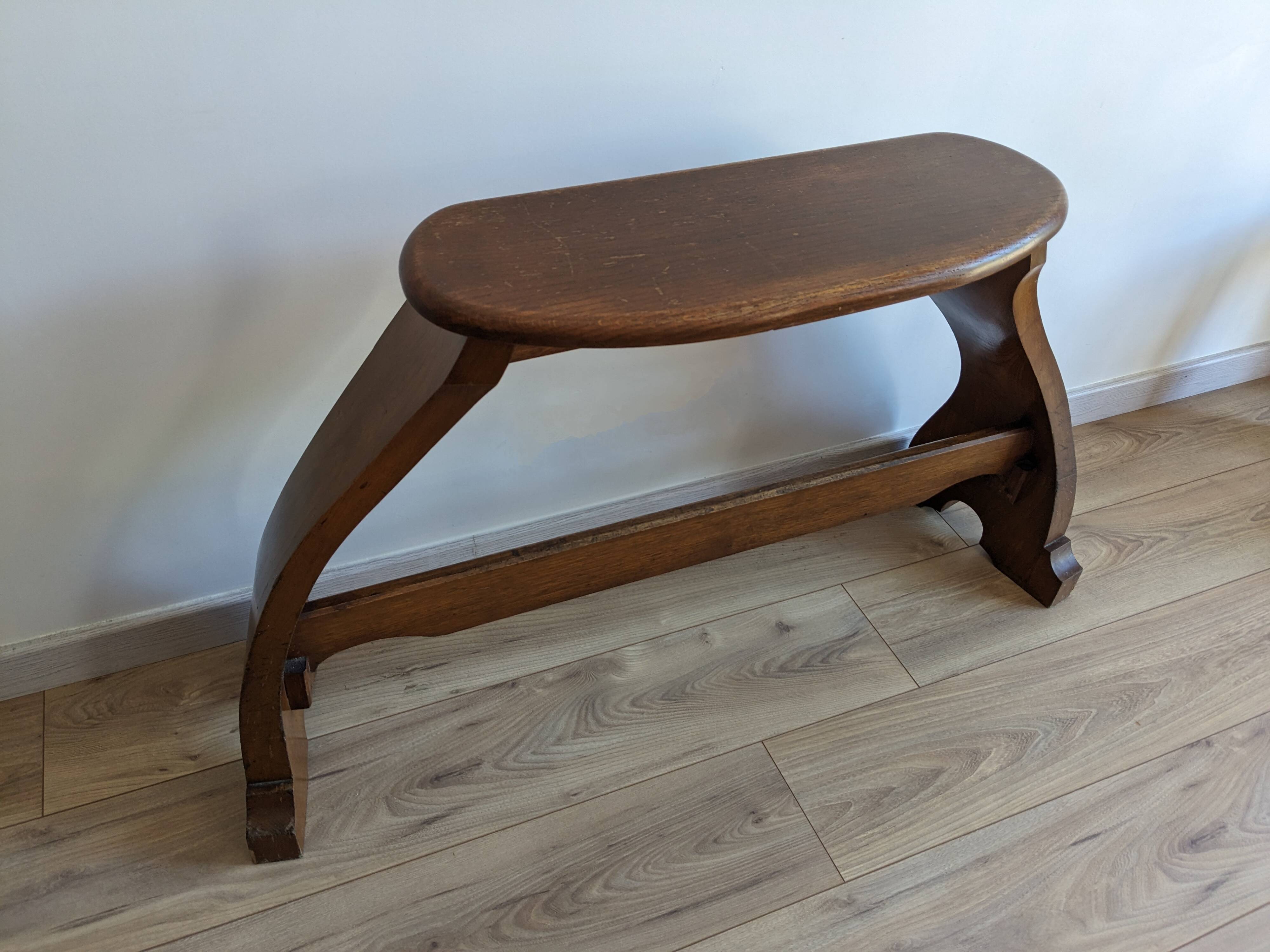 Old church organ bench in Art Nouveau style made of solid oak.