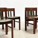 Green leather brutalist dining chairs