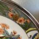 Two Raynaud Limoges plates and Tetard brothers silver.