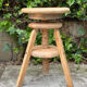 1950s solid oak tripod workshop stool with a screw mechanism.