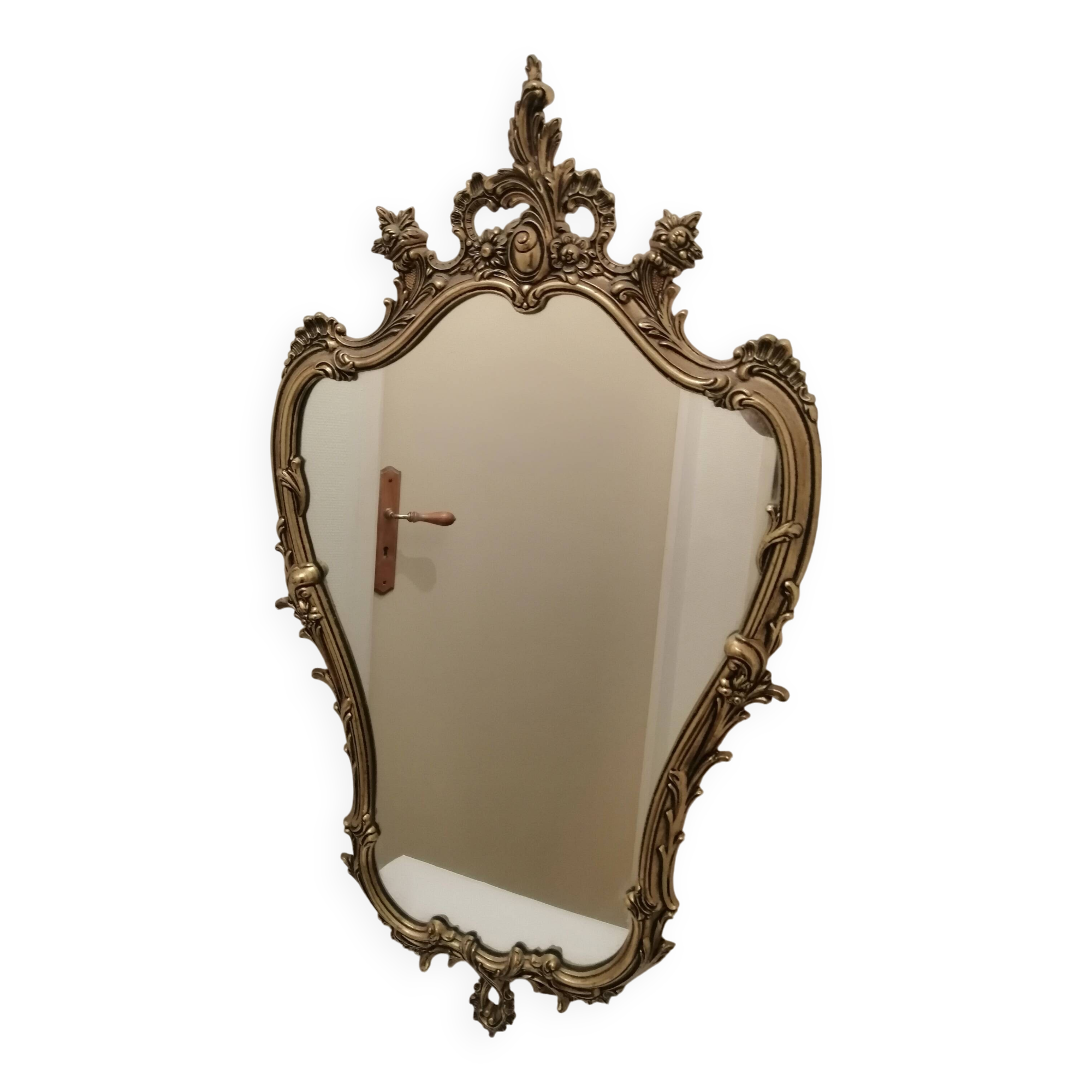 Wall mirror with gold patina ornaments
