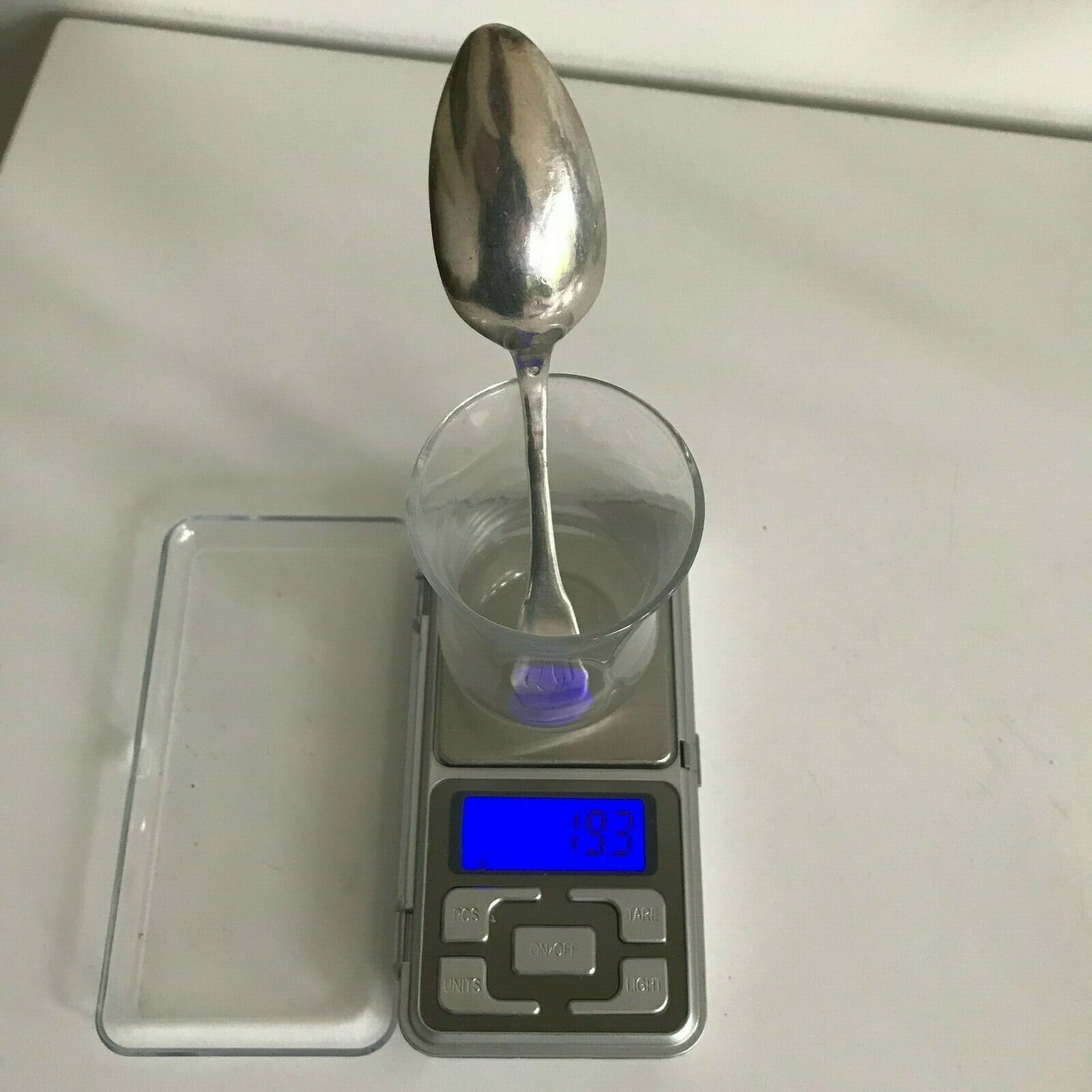 Massive silver spoon punch to identify 1819-1838