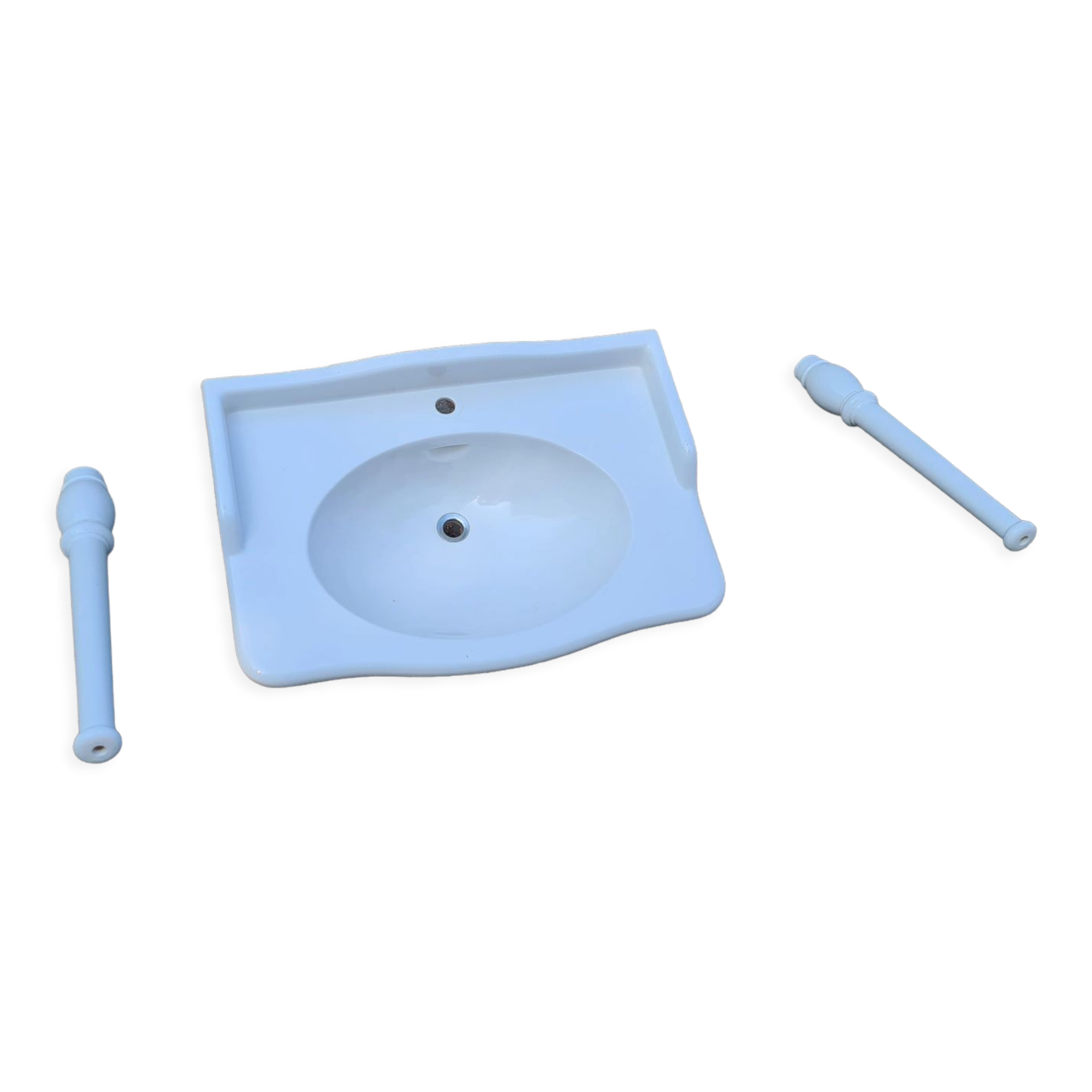 White ceramic wall washbasin with 2 ceramic legs
