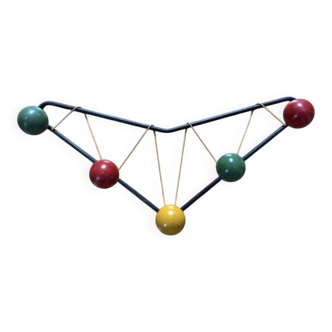 Vintage coat rack in the style of Roger Ferraud.