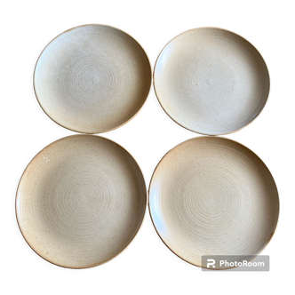 Set of four vintage stoneware plates