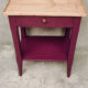Wood and aubergine bedside table