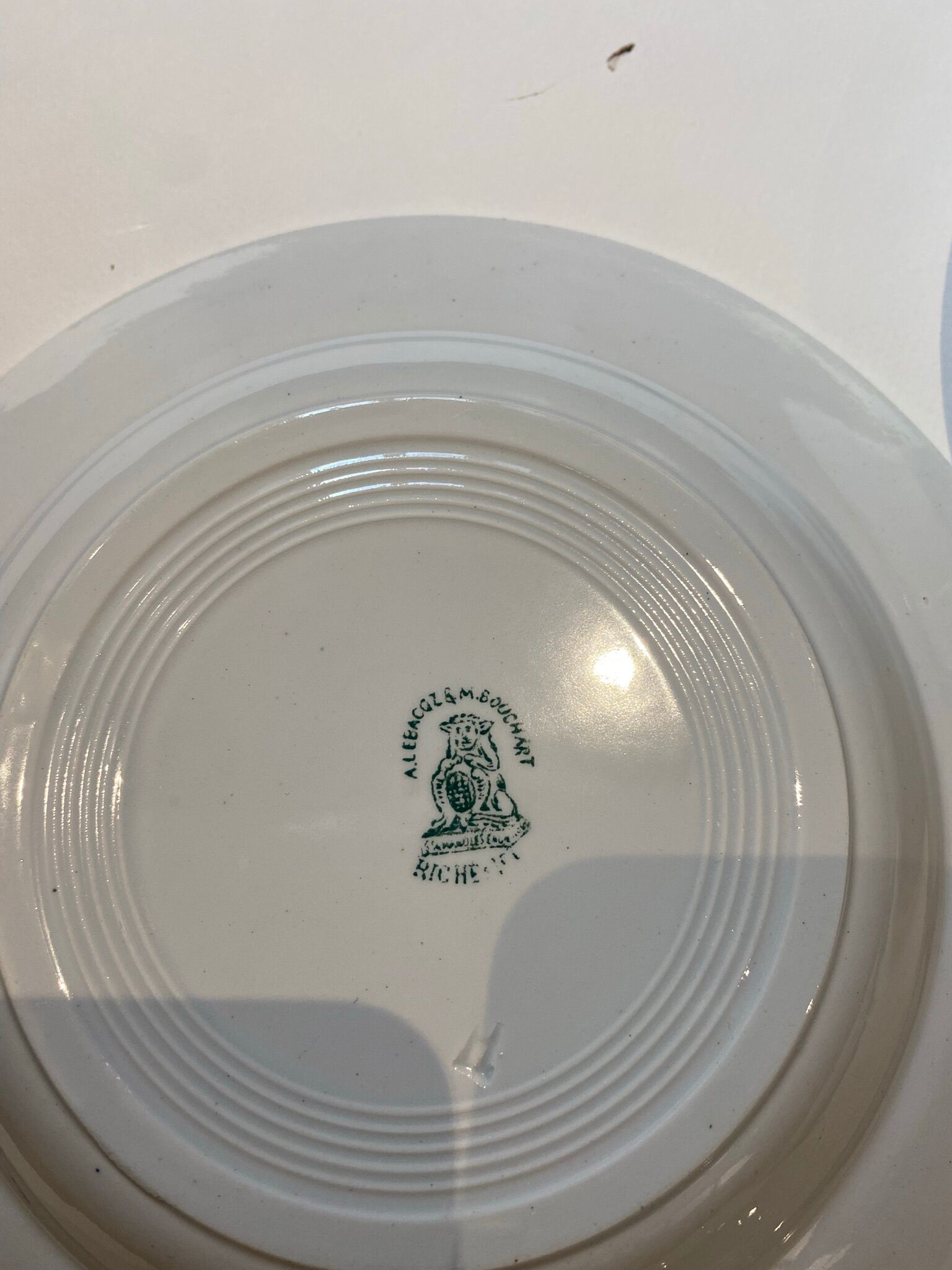 Set of 4 hollow plates, foliage decorations, Manufacture de St-Amand-les-Eaux