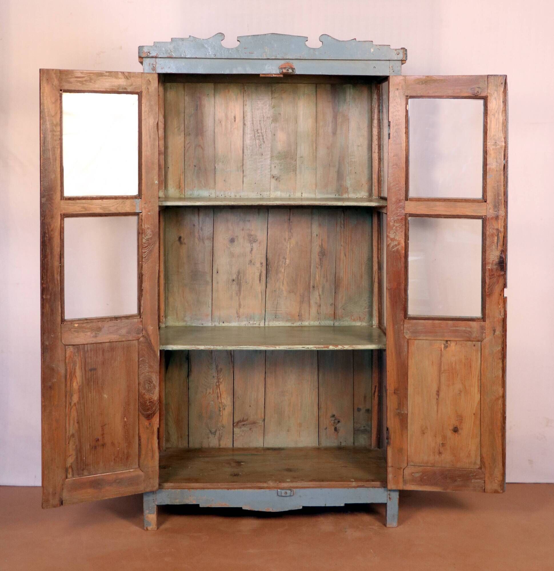 Old art deco display case in original Burmese teak with gray-blue patina