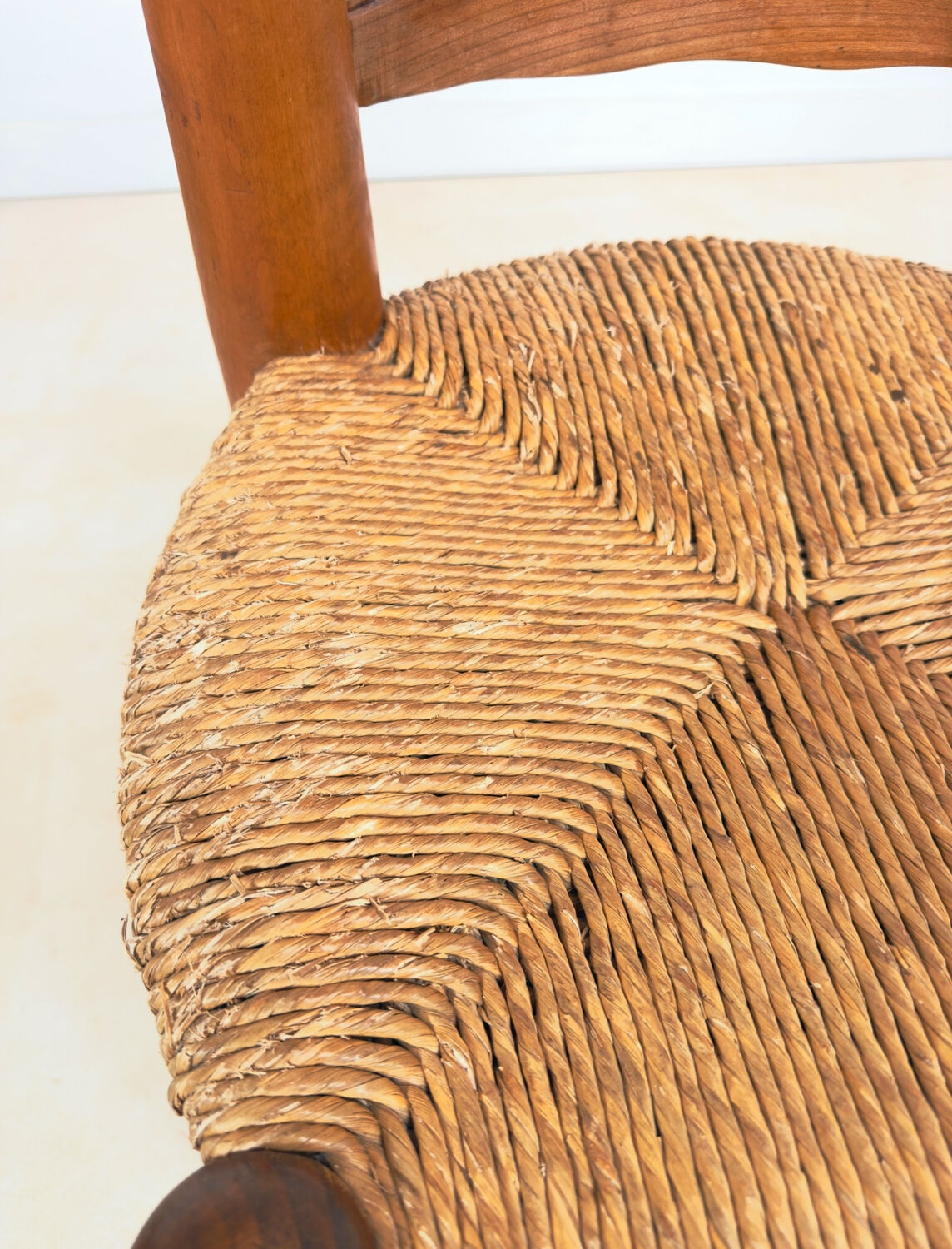 Vintage wooden chair with rush seating