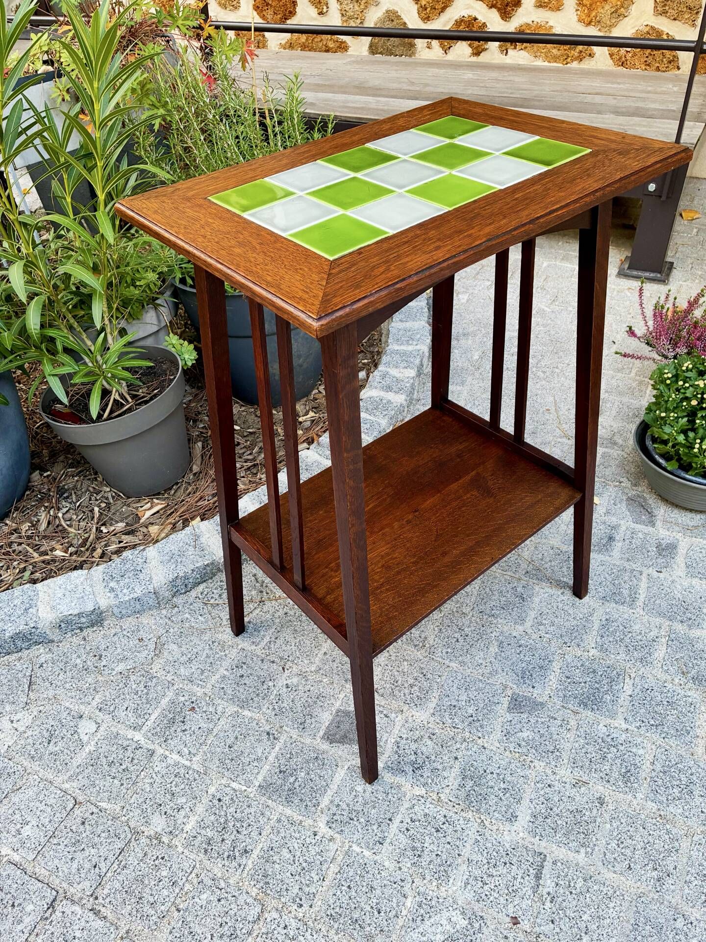 Art Nouveau side table 1910 with double tops in dark oak.
