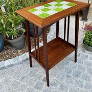 Art Nouveau side table 1910 with double tops in dark oak.