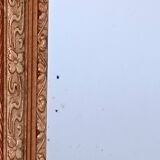 Miroir Napoléon III a riche ornementation dorée