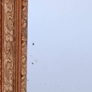 Napoleon III mirror with rich gilded ornamentation