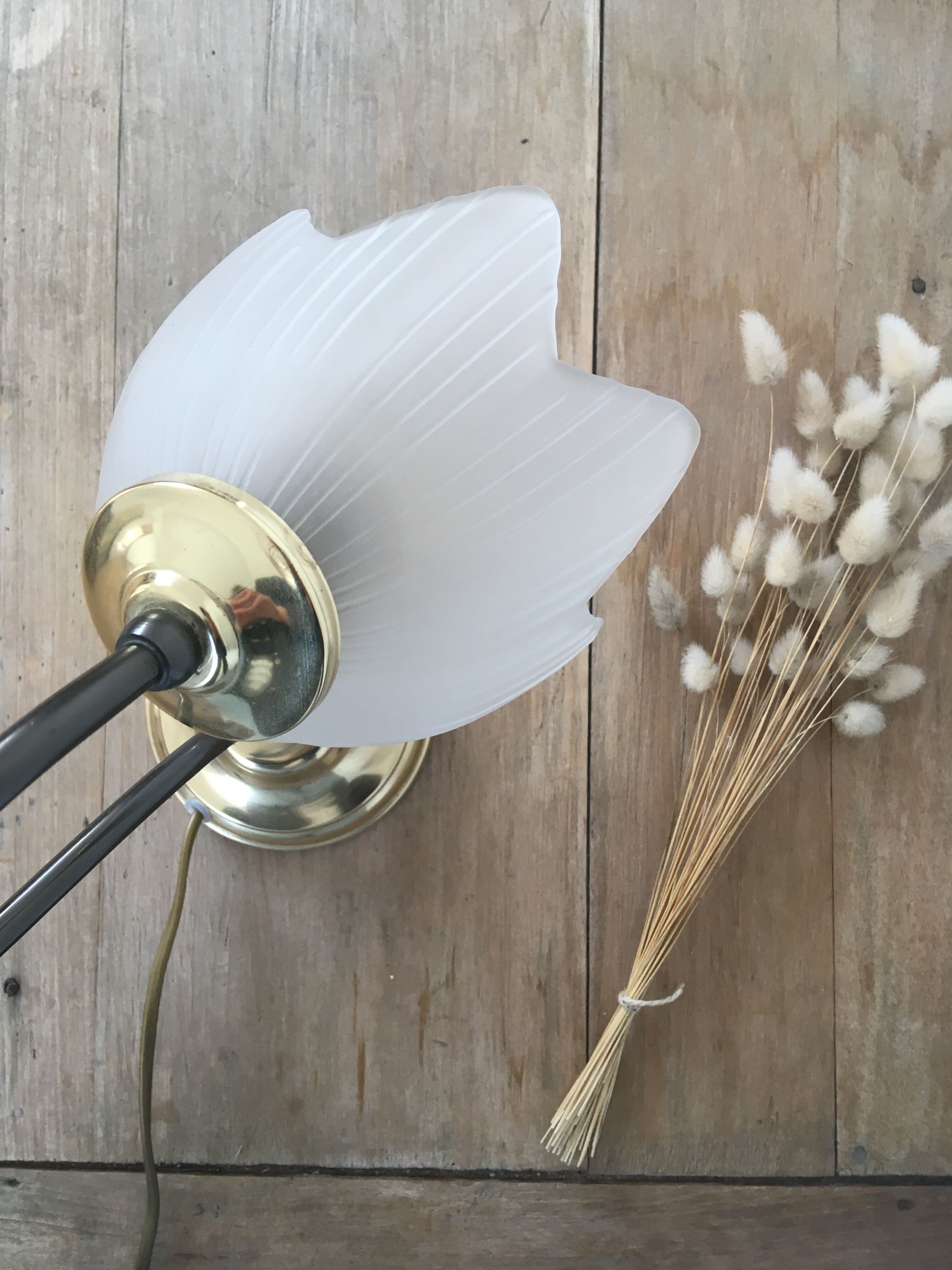 Table lamp with glass globe and brass foot