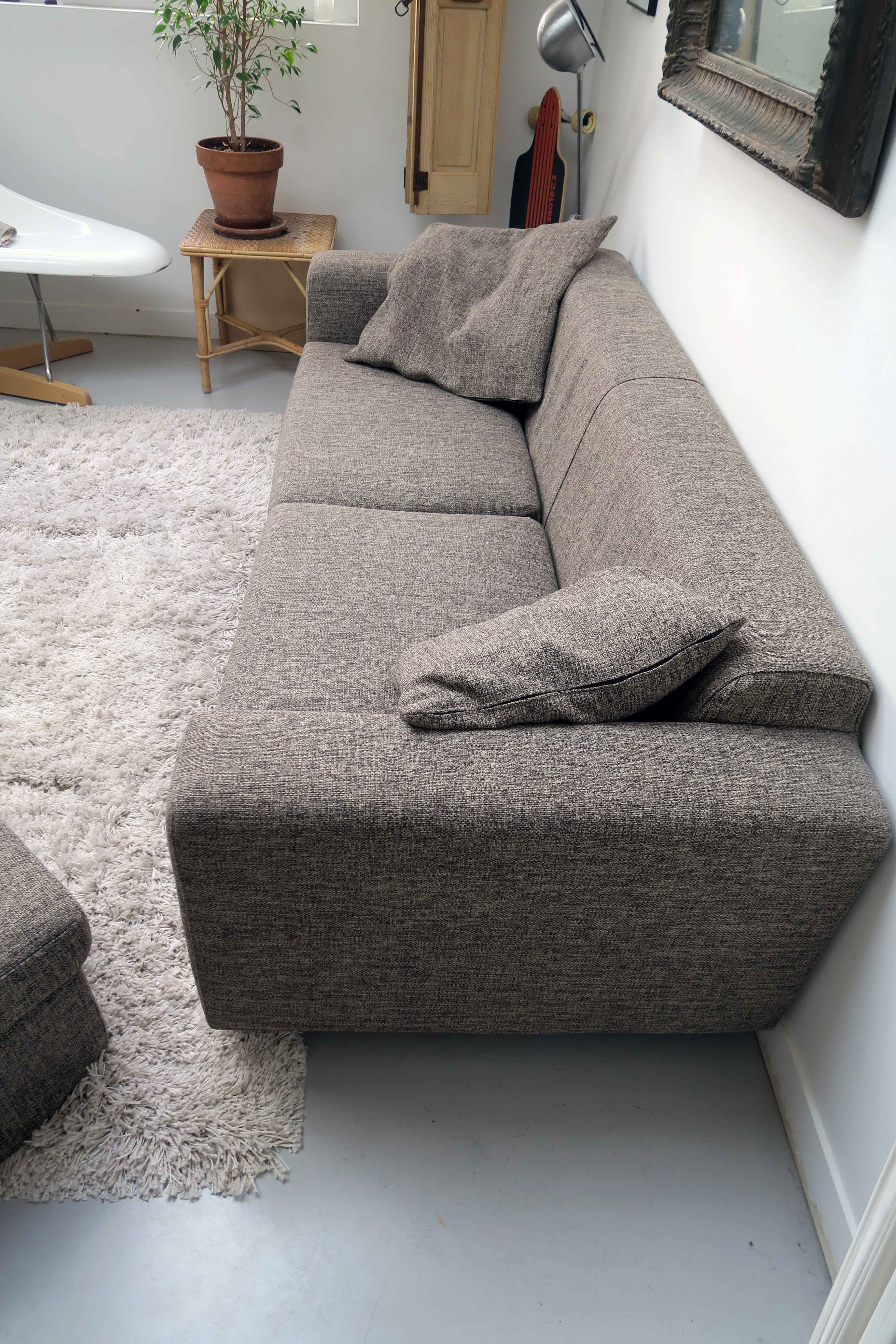 Scandinavian design sofa and its pouf