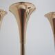 Trio of brass scandinavian candlesticks