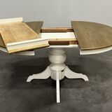 Round extendable oak dining table
