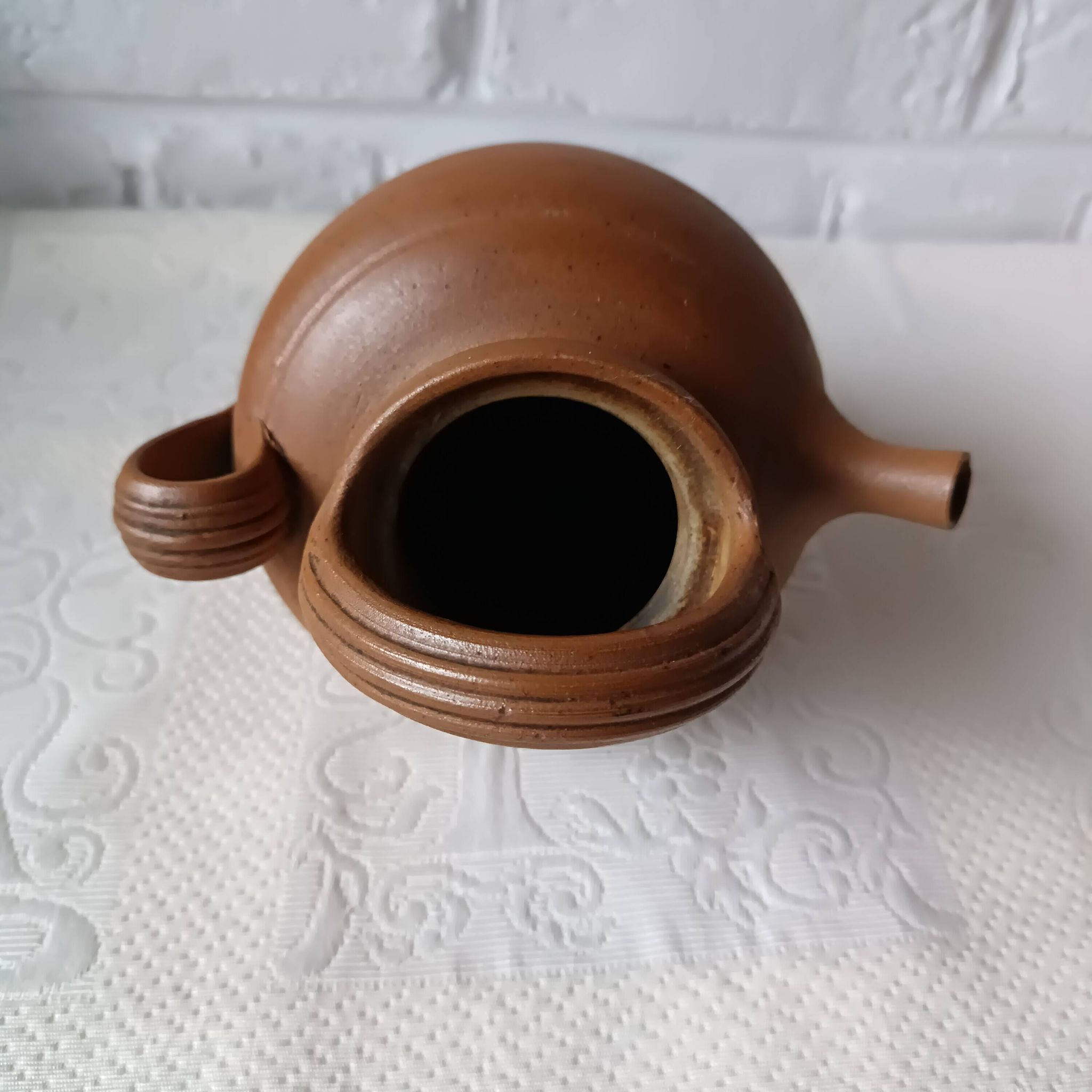 Vintage handmade brown glazed stoneware gargoulette.