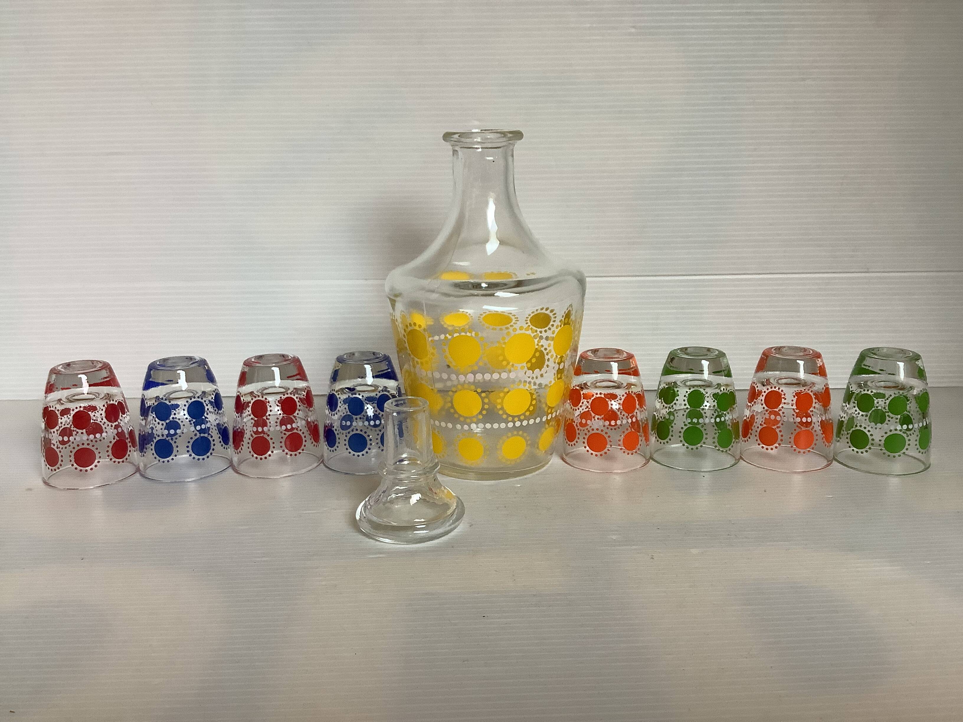 Liqueur service with multicoloured polka dot patterns.
